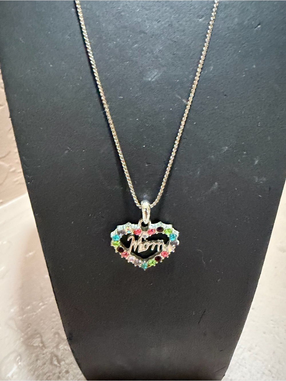 The Scorpio Mother Of Pearl Gold Toned Zodiac Pendant is a stylish and elegant